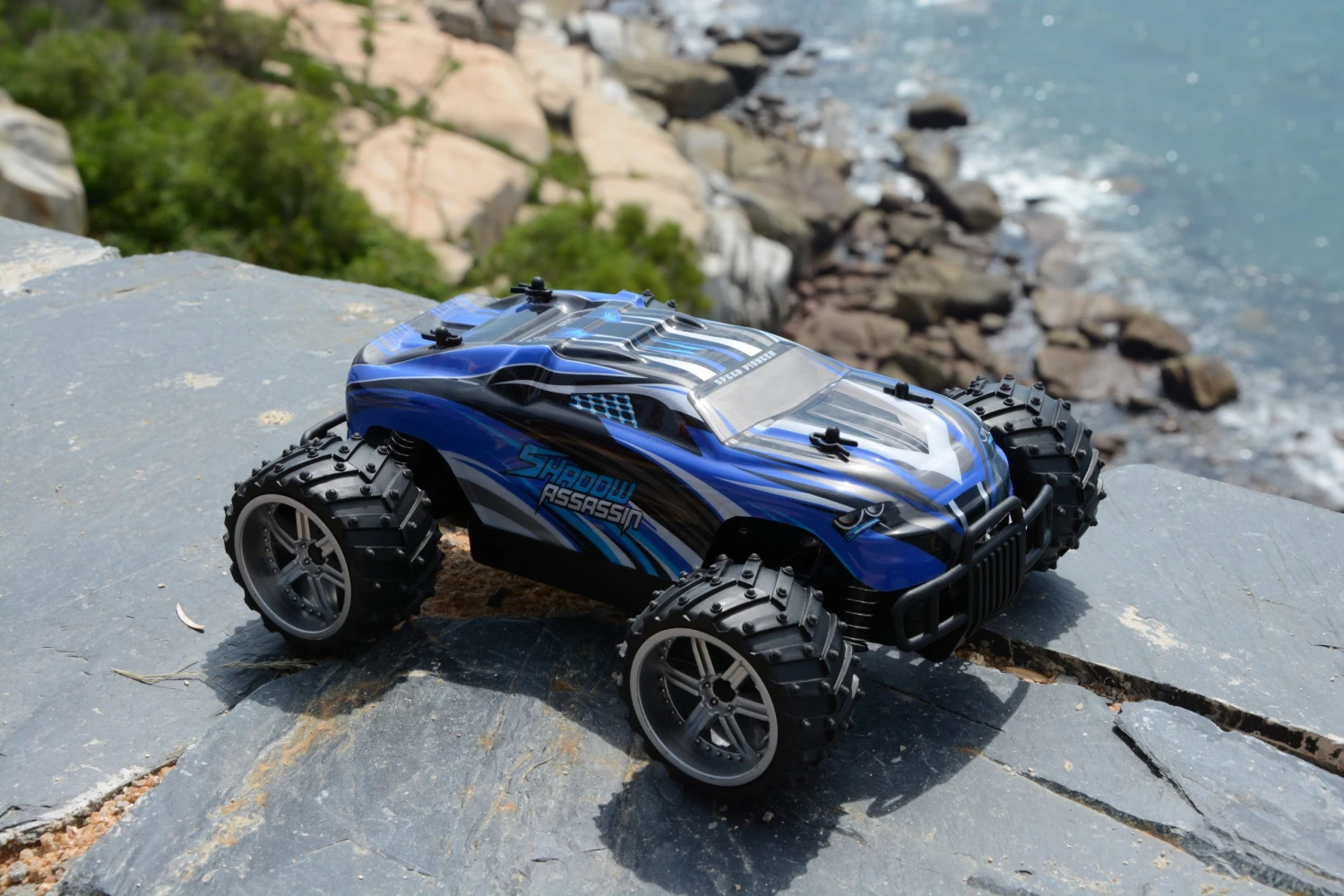 THOMAXX RADIOGRAFISCHE BESTUURBARE AUTO SCHAAL 1:16 X-TRUGGY SHADOW ASSASSIN RTR Blauw 5 THOMAXX RADIOGRAFISCHE BESTUURBARE AUTO SCHAAL 1:16 X-TRUGGY SHADOW ASSASSIN RTR Blauw - Afbeelding 3